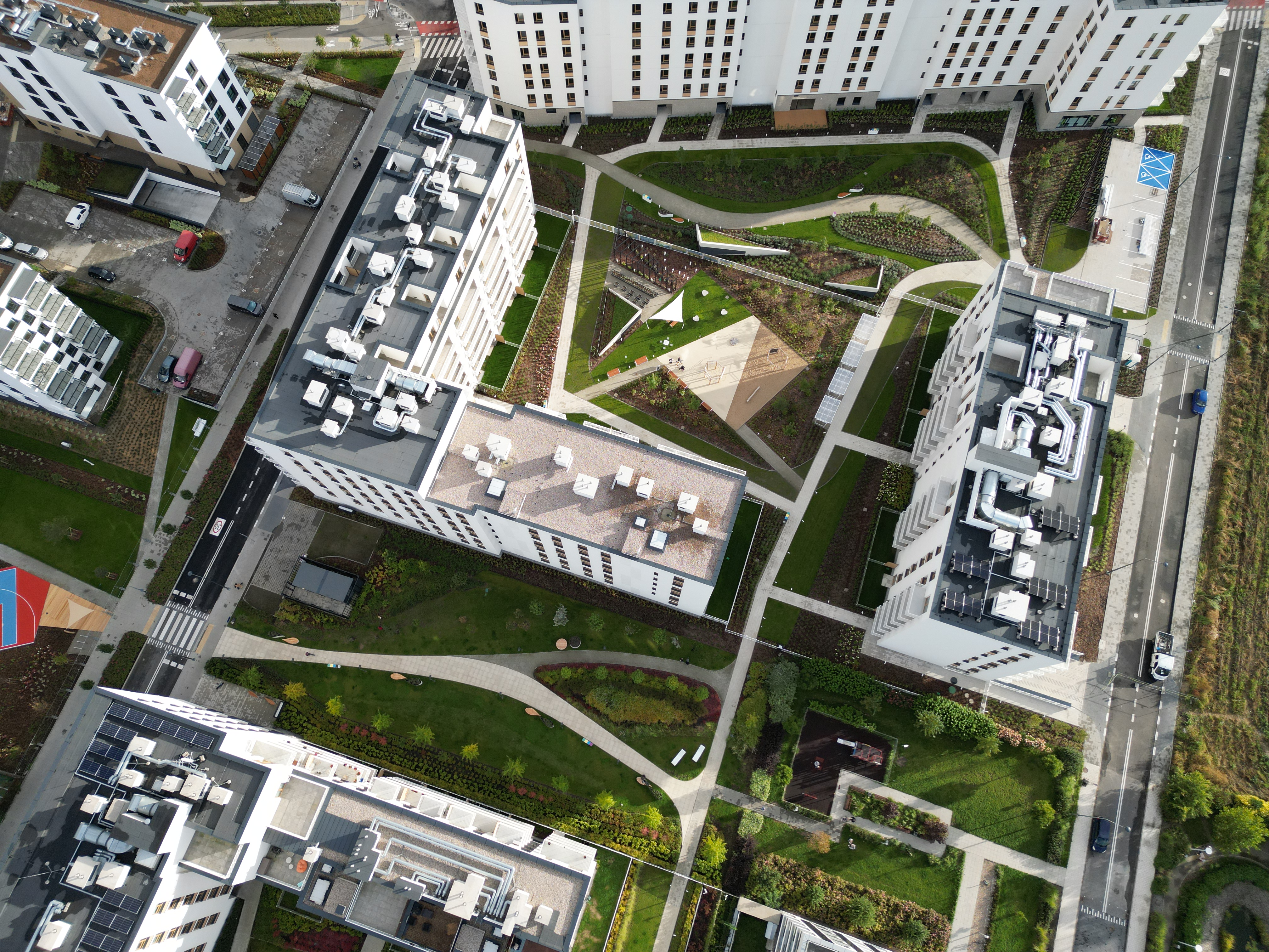 Neowo courtyard meeting the main estate promenade